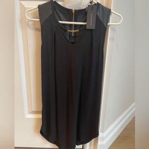 Black sleeveless long tunic style top